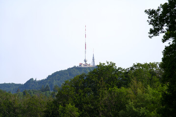 Obraz premium Radio tower, outlook tower and hotel restaurant Uto Kulm at a beautiful sunny summer day. Photo taken June 18th, 2021, Zurich, Switzerland.