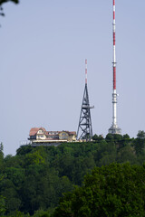 Radio tower, outlook tower and hotel restaurant Uto Kulm at a beautiful sunny summer day. Photo taken June 18th, 2021, Zurich, Switzerland.