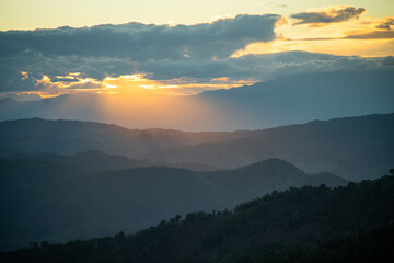 The golden sun contrasts with the azure gold.