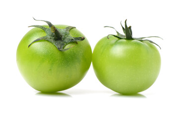 Green tomatoes on white background