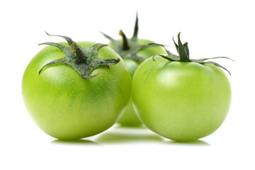 Green tomatoes on white background
