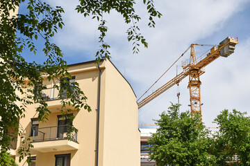 New apartment building in front of a tower crane