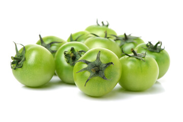 Green tomatoes on white background