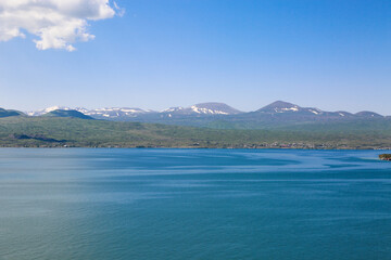 View of scenic Sevan lake in Armenia. Summertime holidays near the lake.