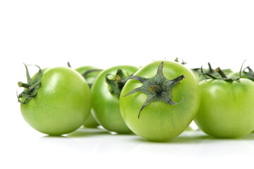 Green tomatoes on white background