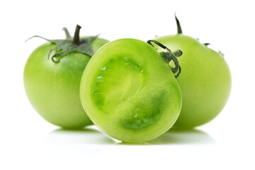 Green tomatoes on white background