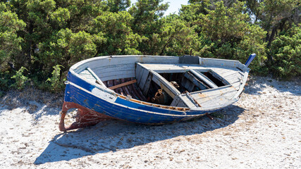 Boat abandoned on Italian beaches by immigrants who crossed the Mediterranean Sea. Migrants who...