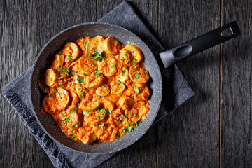 zucchini in a creamy tomato sauce, top view