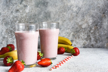 Strawberry cocktail - a milkshake with ice cream and milk. Strawberry smoothie for breakfast.