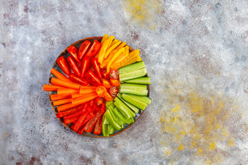 Sliced organic vegetables in a plate ready for eat.