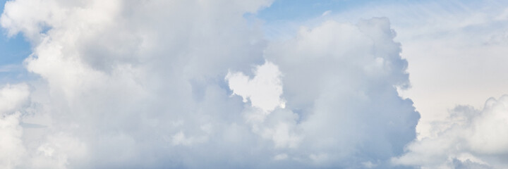 Blue heart shaped clouds. Banner