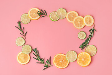 Frame made of healthy citrus fruits on color background
