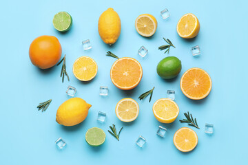 Healthy citrus fruits and ice cubes on color background
