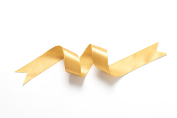 A roll gold color ribbon isolated on white