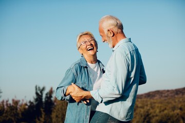 woman man outdoor senior couple happy lifestyle retirement together smiling love old nature mature - Powered by Adobe