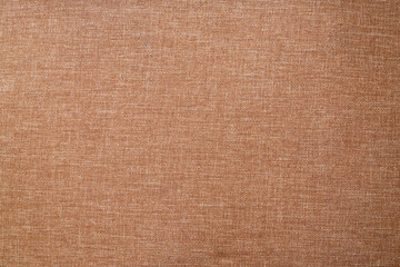Fototapeta na wymiar Clothing brown fabric square texture background, close up of cloth textile surface abstract.