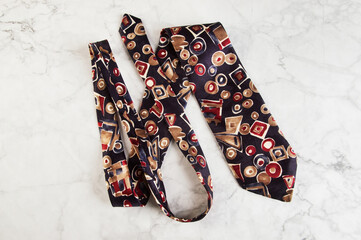 Blue tie with geometric pattern