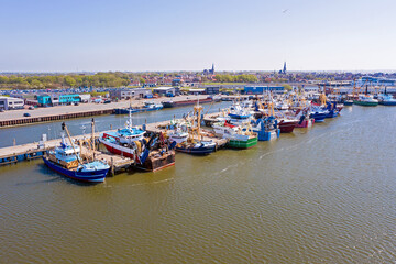 Fototapeta na wymiar Aerial from the fishing harbor from Harlingen in the Netherlands