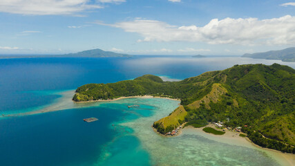 Famous Tourist Site: Sleeping Dinosaur Island located on the island of Mindanao, Philippines. Aerial view of tropical islands and blue sea.