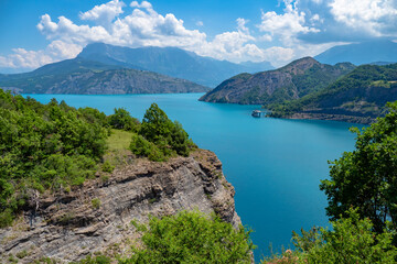 Obraz premium Hydro electric dam and large man made lake in the French Alps