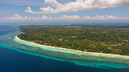 Obraz premium Tropical landscape: island with beautiful beach, palm trees by turquoise water. Panglao island, Bohol, Philippines. Summer and travel vacation concept.