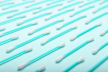 Cotton swabs on color background, closeup