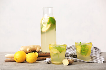 Cold ginger lemonade on table