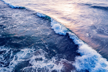 Big wave blue water with sunset sea amazing nature background Aerial top view. Turquoise of ocean at sunny day
