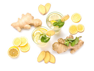 Glasses of cold ginger lemonade on white background