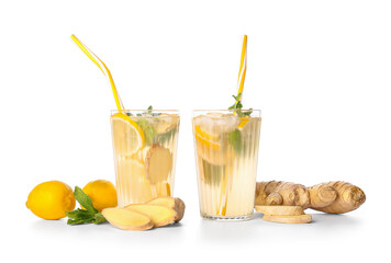 Glasses of cold ginger lemonade on white background