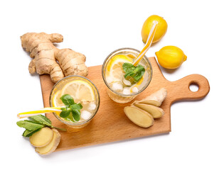 Glasses of cold ginger lemonade on white background