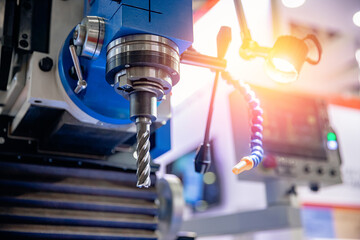 Modern Drilling CNC machine on metal in automatic production car