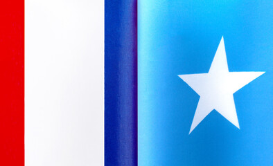 fragments of the national flags of France and the Federal Republic of Somalia close-up