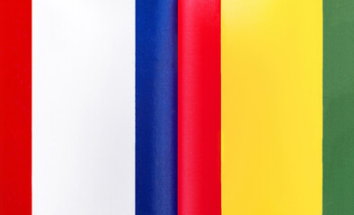 fragments of the national flags of France and the Republic of Guinea close-up