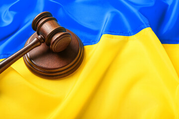 Judge gavel on flag of Ukraine