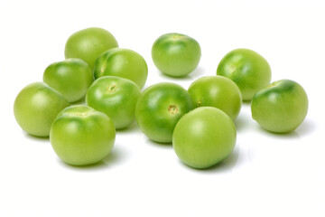 Green tomatoes on white background