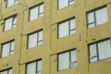 Heat insulation during the construction of an apartment building. Installation of industrial heat...