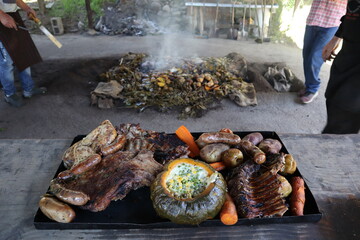 Delicious argentinan / chilenian culantro from colonia suiza bariloche patagonia, barbecue under...