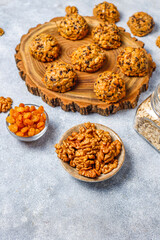 Homemade oatmeal cookies with raisins and walnuts.