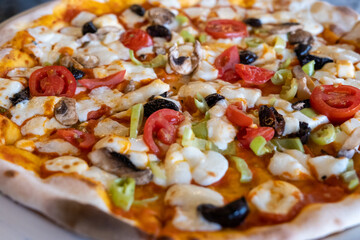 pizza on marble floor, close up