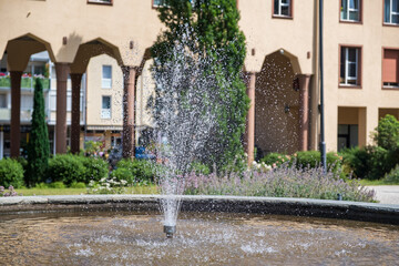 Fototapeta na wymiar Fountain in the park of Kronberg / Germany in the Taunus 