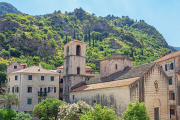 Fototapeta premium Montenegro. Old Town of Kotor - UNESCO World Heritage site. View of ancient Church of St. Mary on sunny summer day