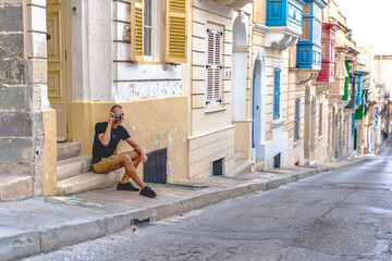 young tourist exploring the streets of Sliema, Malta