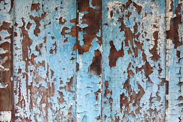 Old wood with crumbled paint background