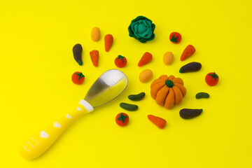 Organic vegetables for baby healthy diet. Play dough cute food creative image concept