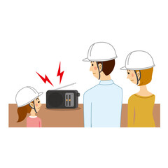 ラジオで避難情報を聞く家族