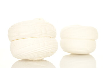 Two sweet tasty white marshmallows, close-up, isolated on white.