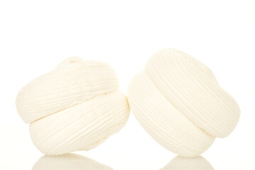 Two sweet tasty white marshmallows, close-up, isolated on white.
