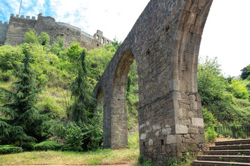Fototapeta na wymiar Ancient ruined fortress and arched bridge in Trabzon, Turkey