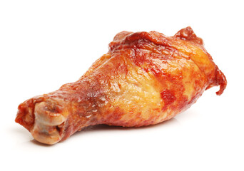Barbecued chicken leg on white background